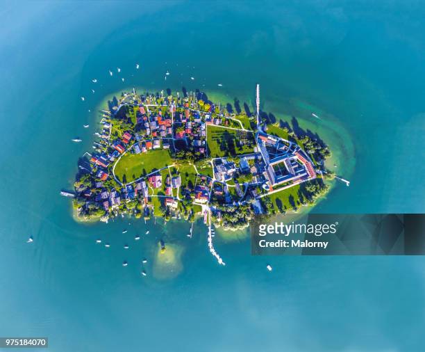 aerial view on fraueninsel, women's island at lake chiemsee. chiemgau, bavaria, germany - chiemsee stockfoto's en -beelden