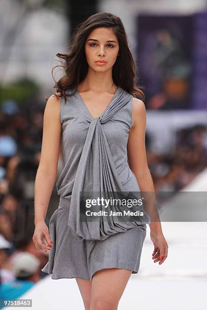 Model displays a design by Trista during the International Designers Mexico Fashion Week at the Capultec Forest on March 7, 2010 in Mexico City,...