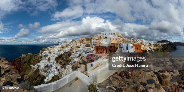 panorama of oia in greece. - hamra stock pictures, royalty-free photos & images