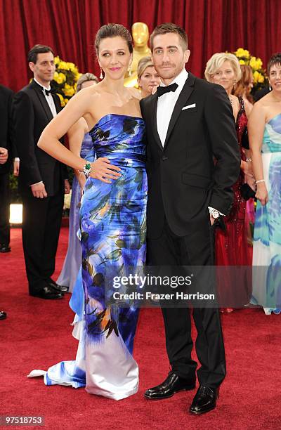 Actors Maggie Gyllenhaal and Jake Gyllenhaal arrive at the 82nd Annual Academy Awards held at Kodak Theatre on March 7, 2010 in Hollywood, California.