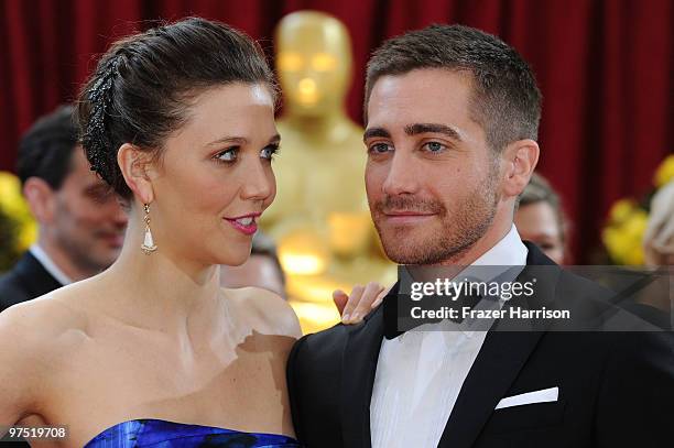 Actors Maggie Gyllenhaal and Jake Gyllenhaal arrive at the 82nd Annual Academy Awards held at Kodak Theatre on March 7, 2010 in Hollywood, California.