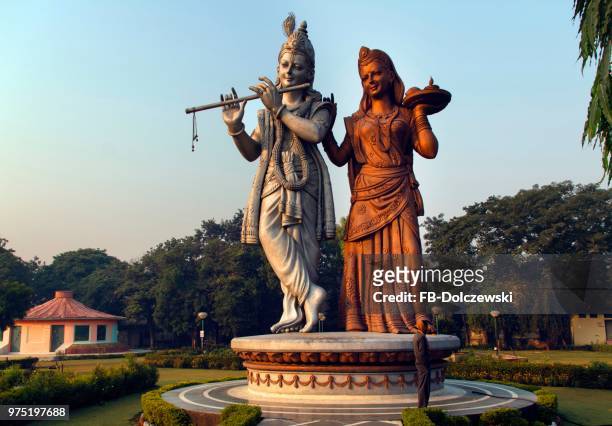 lord krishna and radha statue, shiv murti mandir complex at indira gandhi international airport, new delhi, delhi, india - hindu god krishna stock-fotos und bilder