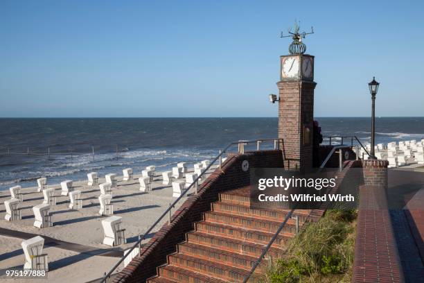 clock tower on the beach promenade, wangerooge, east frisian island, east frisia, lower saxony, germany - wangerooge stock pictures, royalty-free photos & images