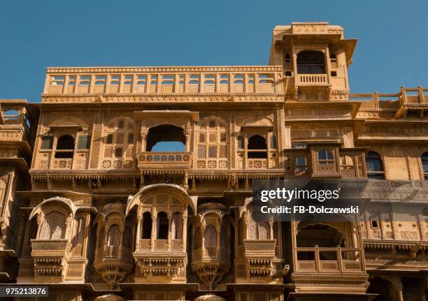 windows and balconies, delicately decorated facade of patwon ki haveli or patwa ki haveli, jaisalmer, rajasthan, india - haveli stock pictures, royalty-free photos & images