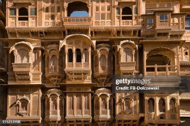 windows and balconies, delicately decorated facade of patwon ki haveli or patwa ki haveli, jaisalmer, rajasthan, india - haveli stock pictures, royalty-free photos & images