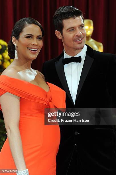 Actress Paula Patton arrives with her husband singer Robin Thicke arrives at the 82nd Annual Academy Awards held at Kodak Theatre on March 7, 2010 in...