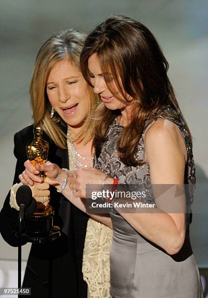 Director Kathryn Bigelow accepts Best Director award for "The Hurt Locker" from presenter Barbra Streisand onstage during the 82nd Annual Academy...