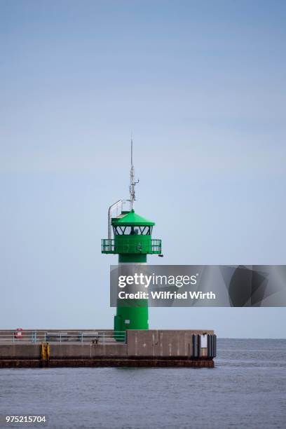 lighthouse at nordermole, travemuende, luebeck, schleswig-holstein, germany - travemuende stock pictures, royalty-free photos & images