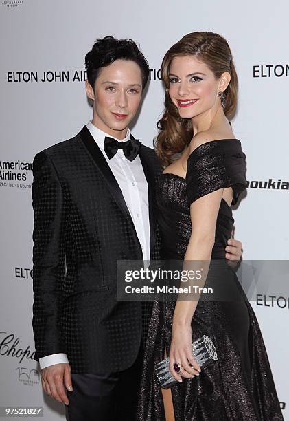 Johnny Weir and Maria Menounos arrive to the 18th Annual Elton John AIDS Foundation Academy Awards Viewing Party held at Pacific Design Center on...