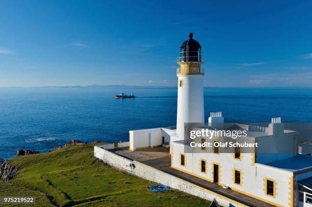 fishing boat and rua reidh lighthouse, melvaig, gairloch, wester ross, scotland, united kingdom - wester ross stockfoto's en -beelden