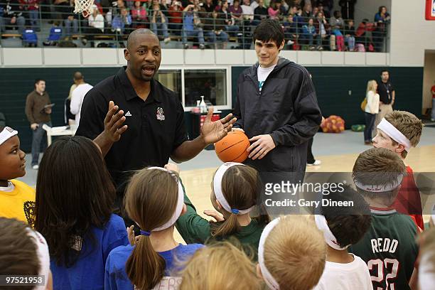 Milwaukee Bucks assistant coach Adrian Griffin and Ersan Ilyasova participate in the annual YMCA basketball clinic on March 7, 2010 at The Bucks...