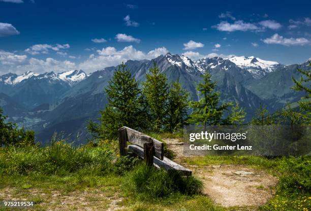 bench at goldried overlooking the grossvenediger, high tauern national park, east tyrol, tyrol, austria - osttirol stock pictures, royalty-free photos & images