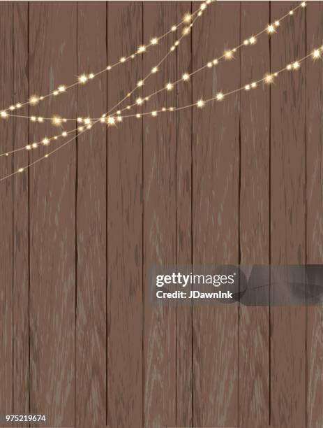 ilustraciones, imágenes clip art, dibujos animados e iconos de stock de fondo de madera rústica con luces de la secuencia - cadena de luces