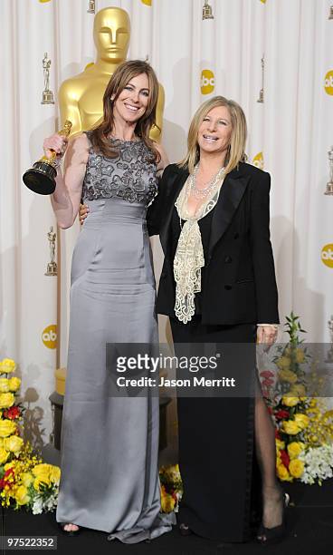Director Kathryn Bigelow, winner of Best Director award for "The Hurt Locker," poses in the press room with presenter Barbra Streisand at the 82nd...