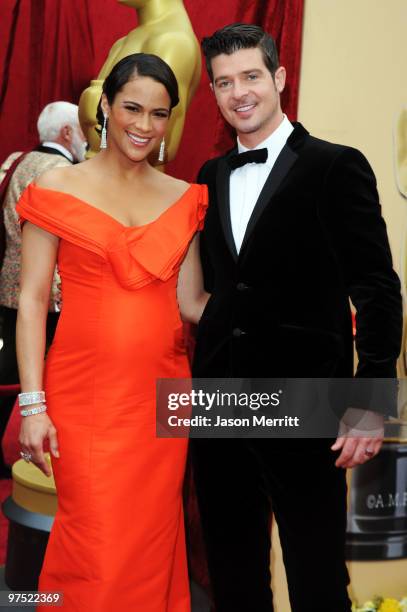 Actress Paula Patton and husband singer Robin Thicke arrives at the 82nd Annual Academy Awards held at Kodak Theatre on March 7, 2010 in Hollywood,...