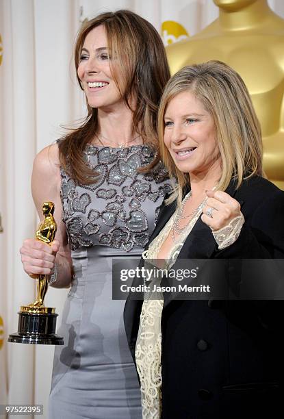 Director Kathryn Bigelow, winner of Best Director award for "The Hurt Locker," poses in the press room with presenter Barbra Streisand at the 82nd...