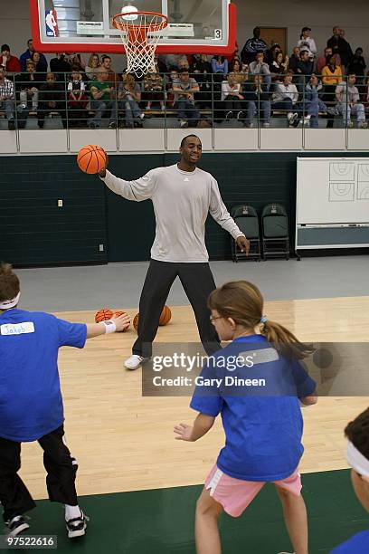 Luc Richard Mbah a Moute of the Milwaukee Bucks participates in the annual YMCA basketball clinic on March 7, 2010 at The Bucks Training Center in...