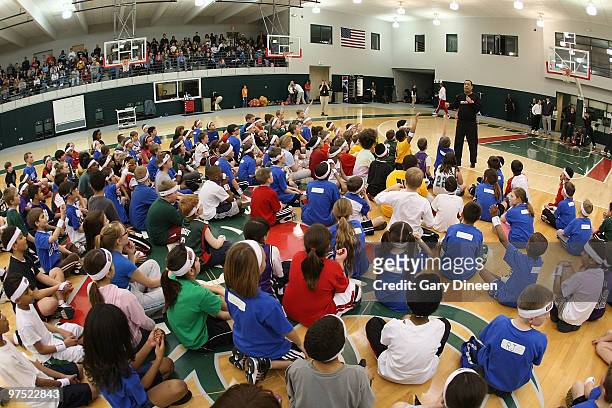 Milwaukee Bucks assistant coach Kelvin Sampson provides closing remarks at the conclusion of the annual YMCA basketball clinic on March 7, 2010 at...