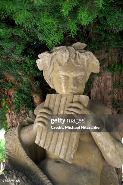 statue of the shepherd god pan in the courtyard garden, residenz, wuerzburg, lower franconia, bavaria, germany - guaira fotografías e imágenes de stock