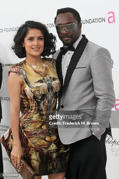 Actress Salma Hayek and singer wil.i.am arrive at the 18th annual Elton John AIDS Foundation's Oscar Viewing Party held at the Pacific Design Center...