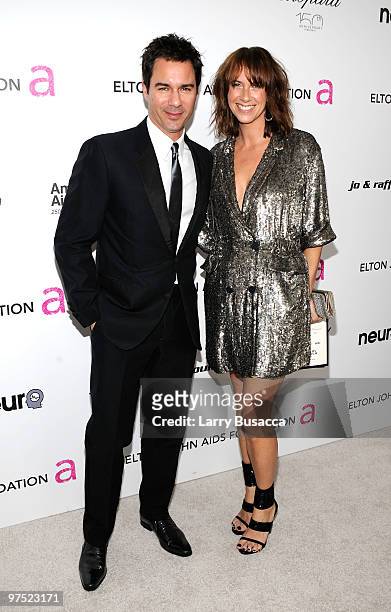 Actor Eric McCormack and Janet Holden attend the 18th Annual Elton John AIDS Foundation Academy Award Party at Pacific Design Center on March 7, 2010...