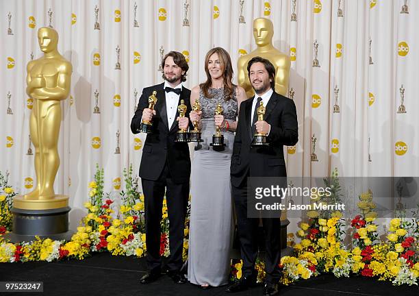 Screenwriter Mark Boal, director Kathryn Bigelow and producer Greg Shapiro, winners of the Best Picture award for "The Hurt Locker," pose in the...