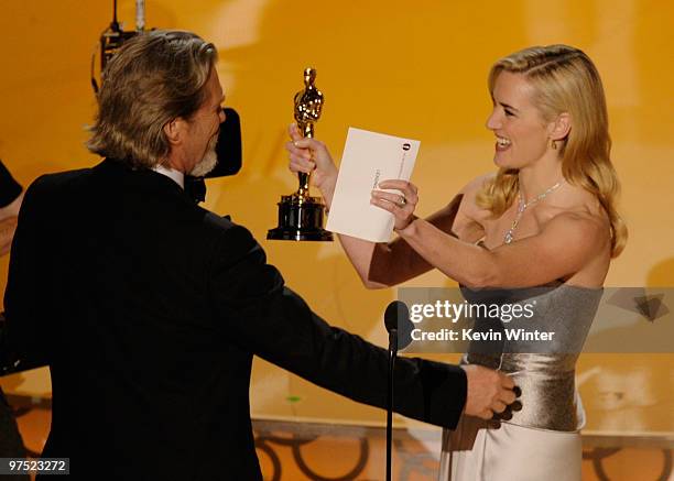 Actor Jeff Bridges accepts Best Actor award for "Crazy Heart" from presenter Kate Winslet onstage during the 82nd Annual Academy Awards held at Kodak...