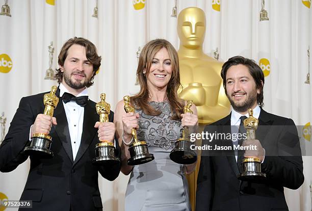 Screenwriter Mark Boal, director Kathryn Bigelow and producer Greg Shapiro, winners of the Best Picture award for "The Hurt Locker," pose in the...