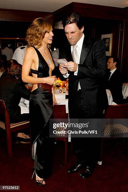 Actors Hilary Swank and Jon Hamm attend the 2010 Vanity Fair Oscar Party hosted by Graydon Carter at the Sunset Tower Hotel on March 7, 2010 in West...