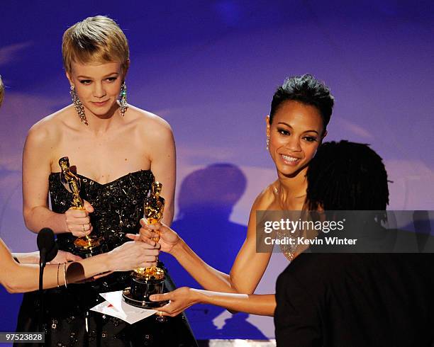 Actresses Carey Mulligan and Zoe Saldana present onstage during the 82nd Annual Academy Awards held at Kodak Theatre on March 7, 2010 in Hollywood,...