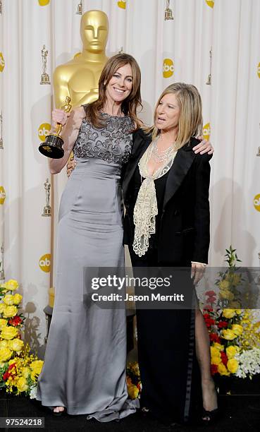 Director Kathryn Bigelow, winner of Best Director award for "The Hurt Locker," poses in the press room with presenter Barbra Streisand at the 82nd...