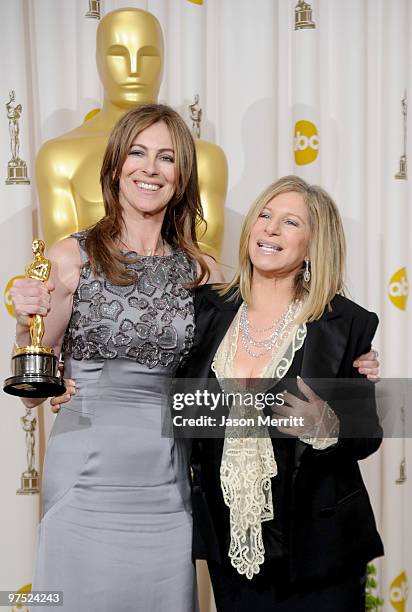 Director Kathryn Bigelow, winner of Best Director award for "The Hurt Locker," poses in the press room with presenter Barbra Streisand at the 82nd...