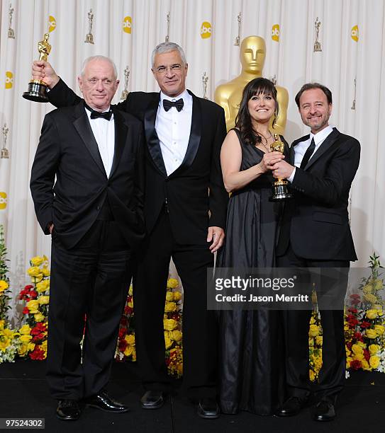 Animal activist Ric O'Barry, director Louie Psihoyos, and producers Paula DuPre Pesman and Fisher Stevens, winners Best Documentary Feature award for...