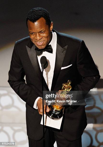 Screenwriter Geoffrey Fletcher accepts Best Adapted Screenplay award for "Precious: Based on the Novel 'Push' by Sapphire" award onstage during the...