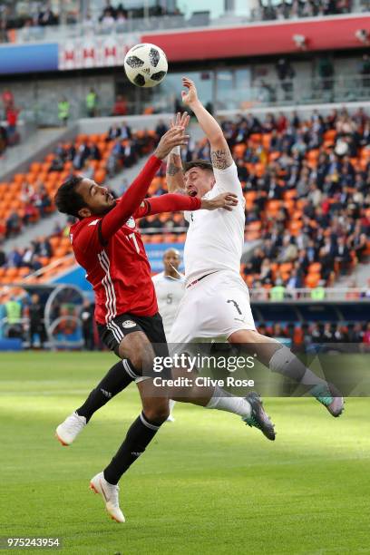 Kahraba of Egypt and Cristian Rodriguez of Uruguay battle for the header during the 2018 FIFA World Cup Russia group A match between Egypt and...