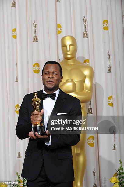 Geoffrey Fletcher poses with his Oscar at the 82nd Academy Awards at the Kodak Theater in Hollywood, California on March 07, 2010. He won Best...