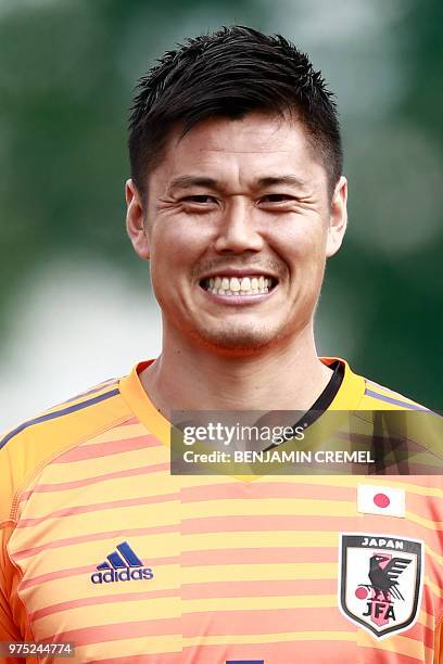 Japan's goalkeeper Eiji Kawashima poses for a picture during a training session of the Japanese national football team in Kazan on June 15 during the...