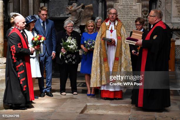 Dean of Westminster, John Hall , accompanied by first wife Jane Hawking and daughter Lucy Hawking , presides over the internment of the ashes of...