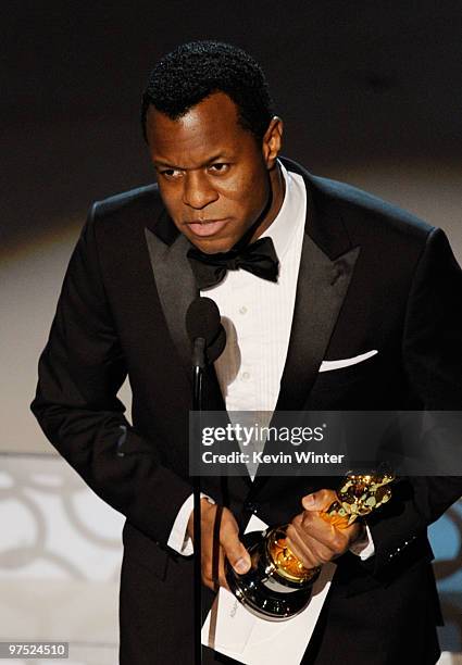 Screenwriter Geoffrey Fletcher accepts Best Adapted Screenplay award for "Precious: Based on the Novel 'Push' by Sapphire" award onstage during the...