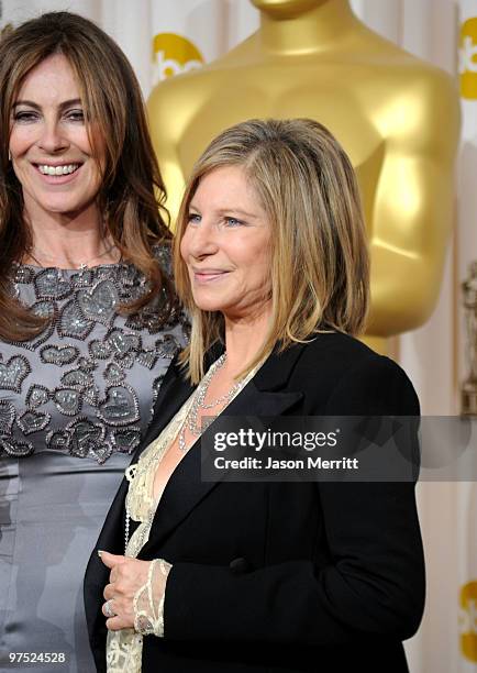 Director Kathryn Bigelow, winner of Best Director award for "The Hurt Locker," poses in the press room with presenter Barbra Streisand at the 82nd...