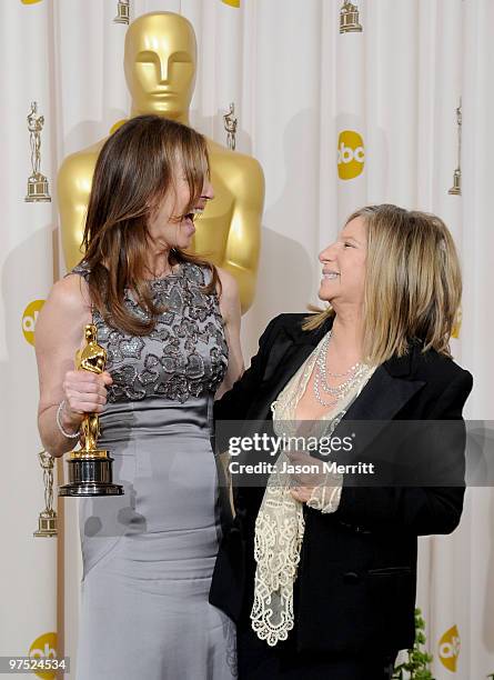 Director Kathryn Bigelow, winner of Best Director award for "The Hurt Locker," poses in the press room with presenter Barbra Streisand at the 82nd...