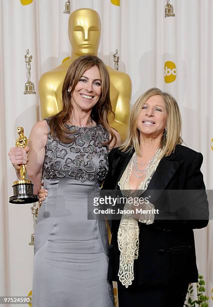 Director Kathryn Bigelow, winner of Best Director award for "The Hurt Locker," poses in the press room with presenter Barbra Streisand at the 82nd...