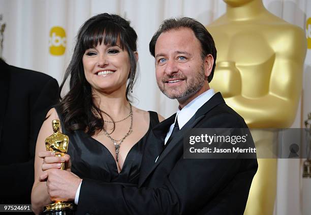 Producers Paula DuPre Pesman and Fisher Stevens, winners Best Documentary Feature award for "The Cove," pose in the press room at the 82nd Annual...