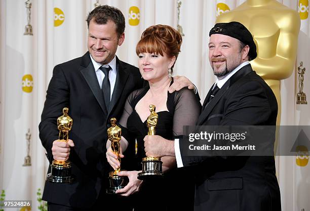 Makeup artists Joel Harlow, Mindy Hall and Barney Burman, winners of Best Makeup award for "Star Trek," pose in the press room at the 82nd Annual...