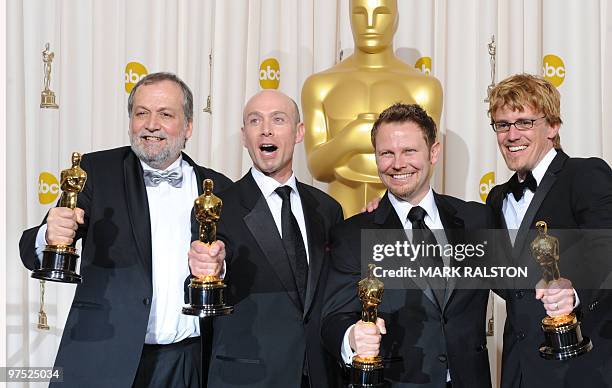 Joe Letteri, Stephen Rosenbaum, Richard Baneham and Andrew R. Jones celebrate their Oscar for Achievement in Visual Effects for "Avatar" during the...