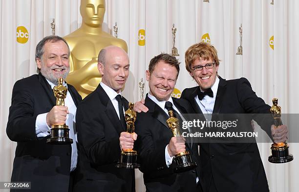Joe Letteri, Stephen Rosenbaum, Richard Baneham and Andrew R. Jones celebrate their Oscar for Achievement in Visual Effects for "Avatar" during the...