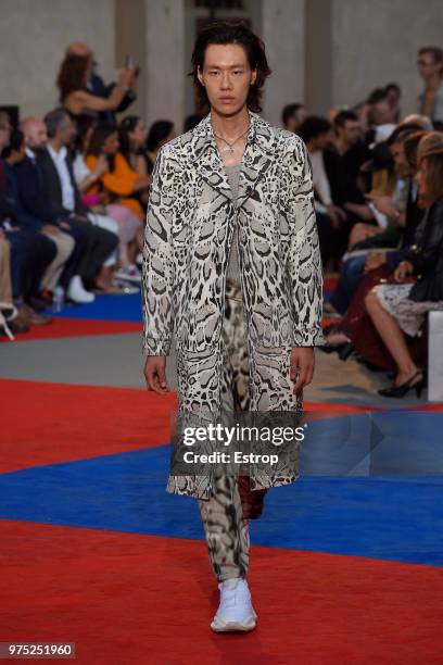 Model walks the runway at the Roberto Cavalli show during the 94th Pitti Immagine Uomo on June 13, 2018 in Florence, Italy.