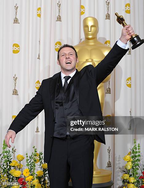 Mauro Fiore celebrates his Oscar for Achievement in Cinematography for "Avatar" during the 82nd Academy Awards at the Kodak Theater in Hollywood,...
