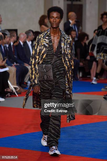 Model walks the runway at the Roberto Cavalli show during the 94th Pitti Immagine Uomo on June 13, 2018 in Florence, Italy.