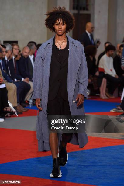 Model walks the runway at the Roberto Cavalli show during the 94th Pitti Immagine Uomo on June 13, 2018 in Florence, Italy.